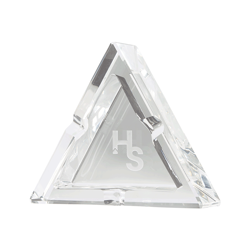 Close-up of the modern glass ashtray showcasing its thick, clear glass design