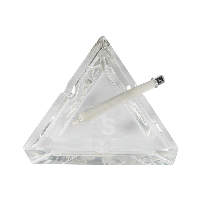 Outdoor setting with the premium ashtray on a patio table, ideal for smoking