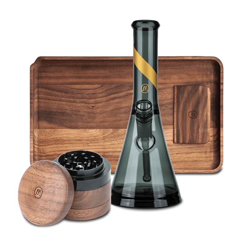 Close-up of the smoked glass water pipe included in the Tropical Escape Bundle, showcasing its elegant design.
