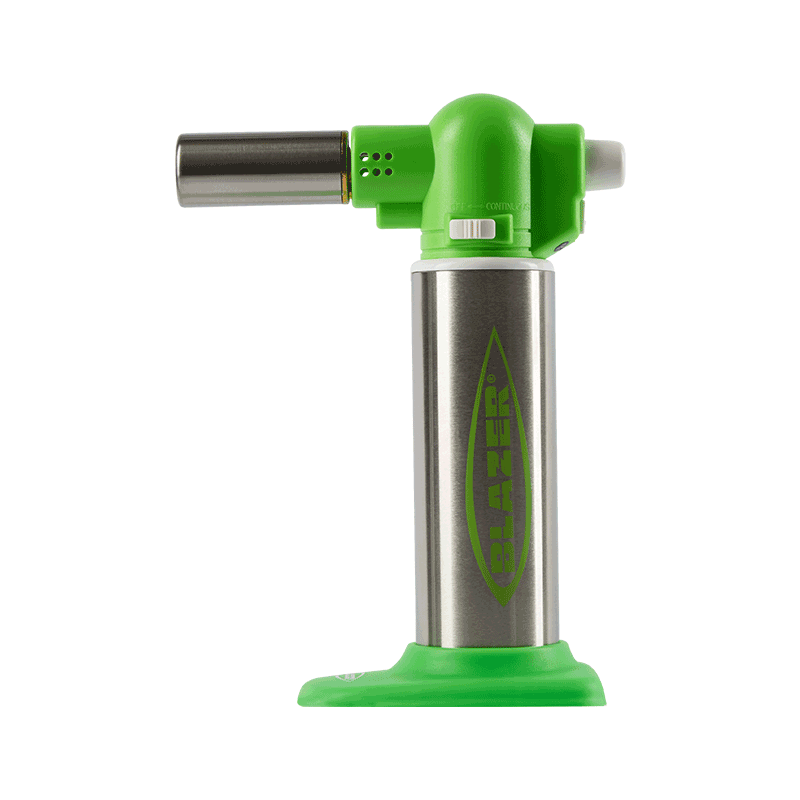 Professional kitchen torch in action during culinary preparation