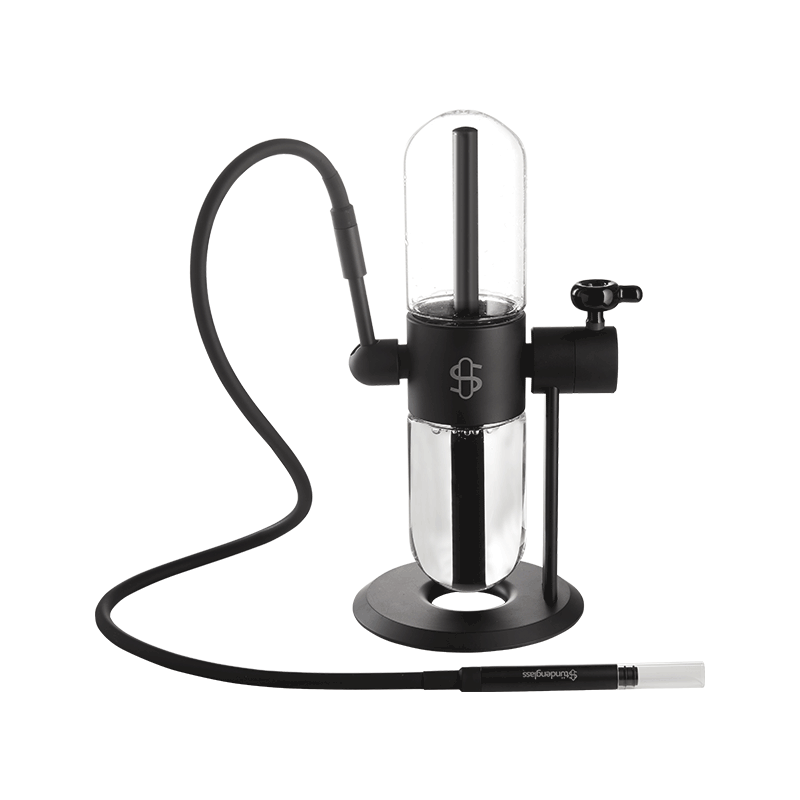 Using the Stündenglass gravity hookah with water globe and mouthpiece