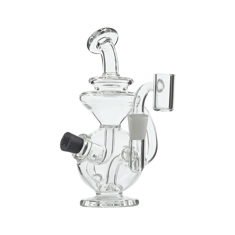 Angled top-down view of MJ Arsenal Mini Jig with quartz banger showing the built-in storage chamber Angled top-down view of MJ Arsenal Mini Jig with quartz banger showing the built-in storage chamber