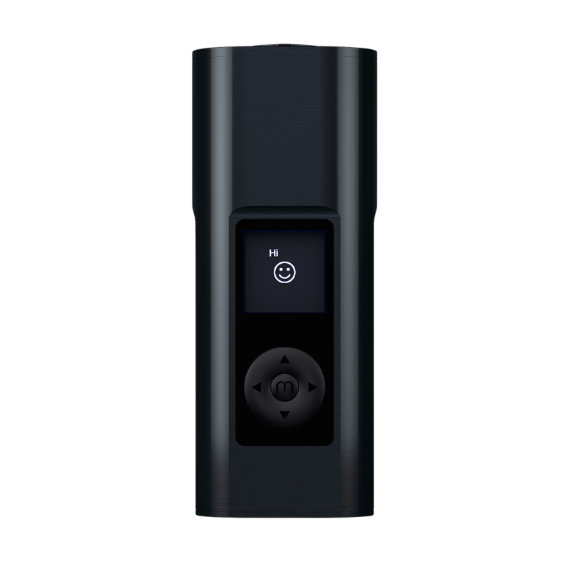 Person holding a dry herb vaporizer with long battery life for portable vaping
