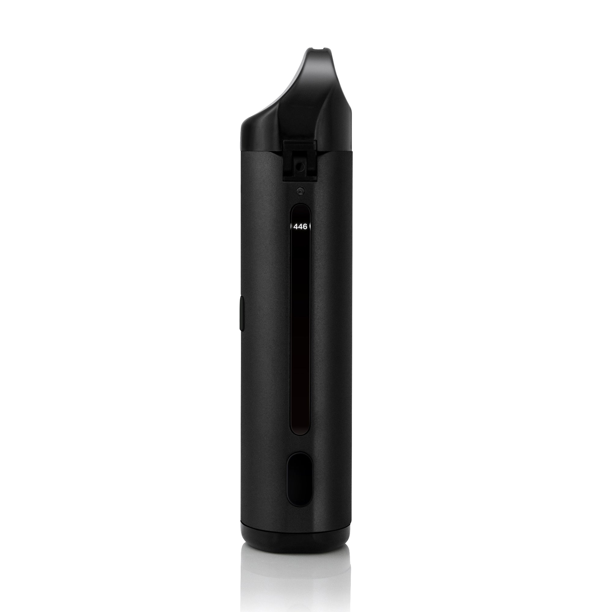 User filling dry herbs into the Atomic9 vaporizer with herb scoop