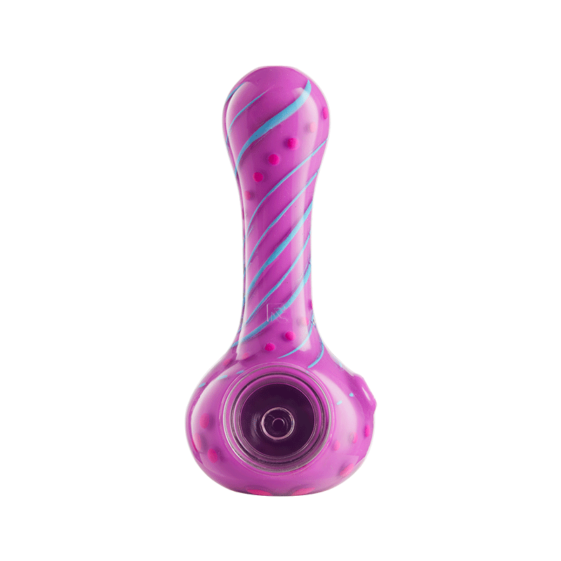 Vibrant floral silicone pipe in use, demonstrating its portability and ease of handling.