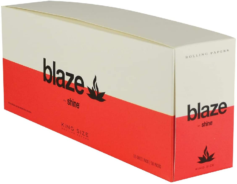 Close-up of Shine Blaze king size rolling papers showing thin sheets for dry herbs