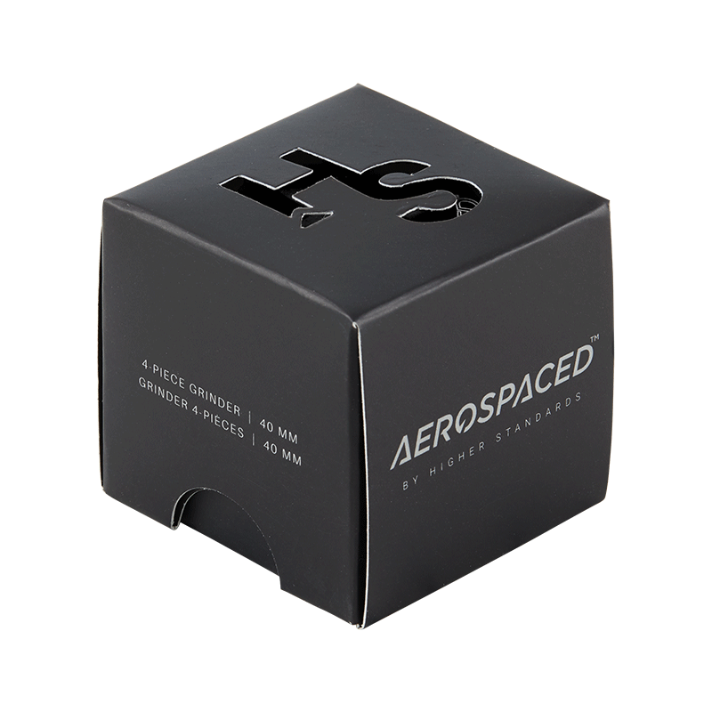 Herb grinder with pollen catcher in use, shredding herbs smoothly