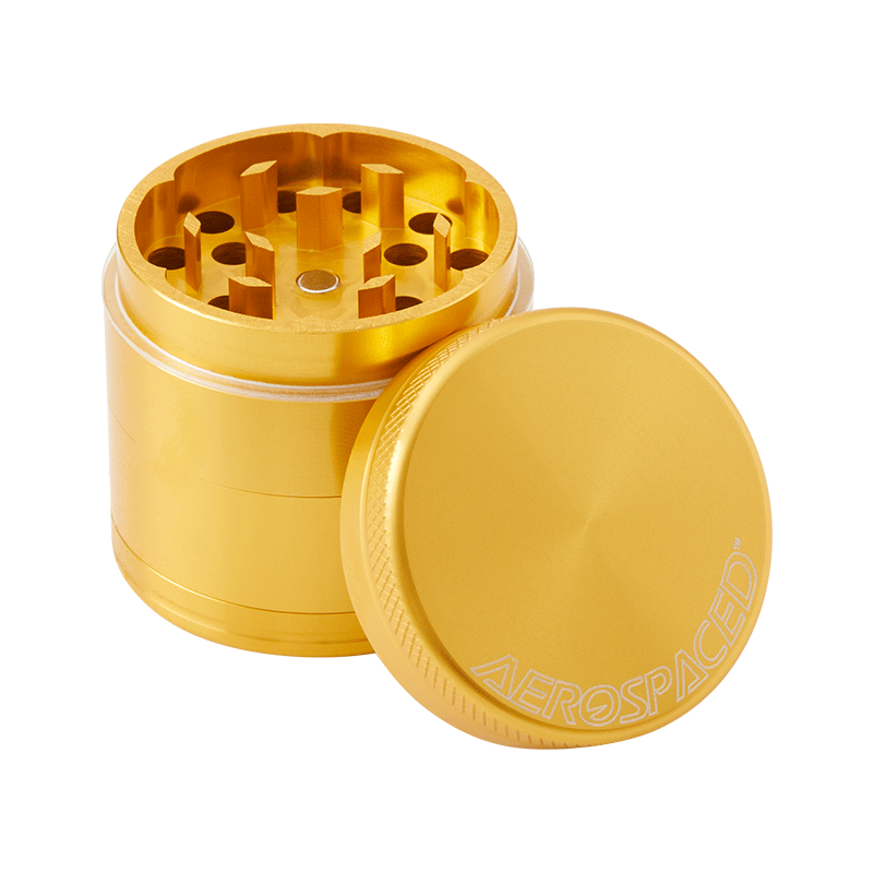 Close-up of Aerospaced herb grinder with diamond teeth and anodized finish