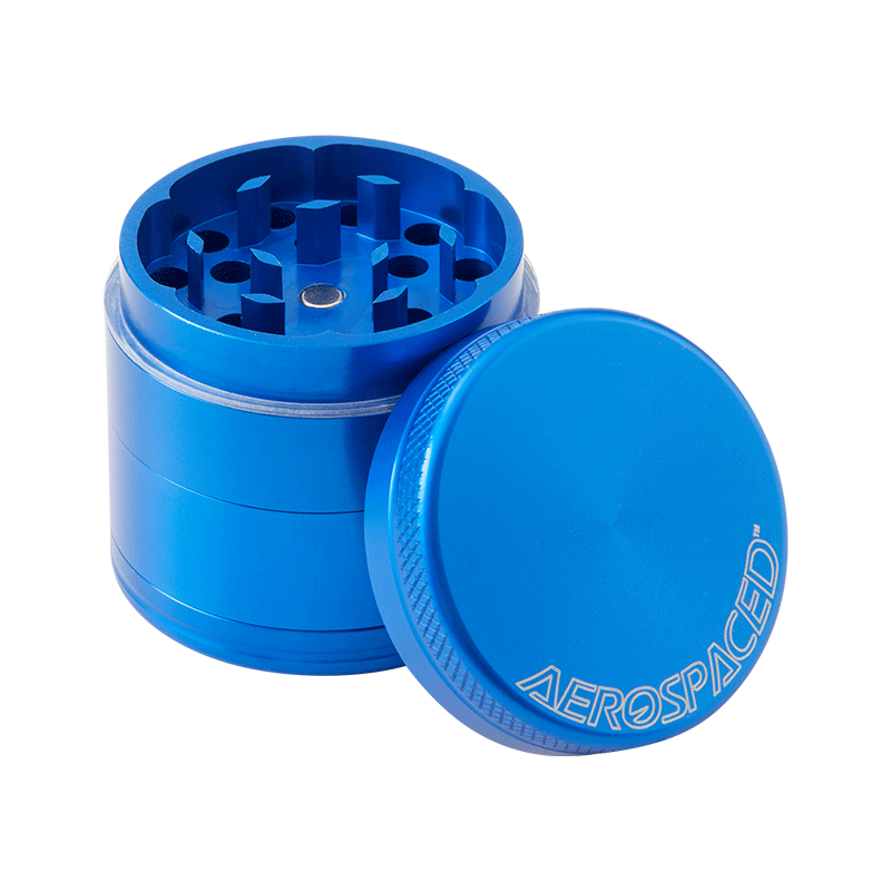 Close-up of Aerospaced herb grinder with diamond teeth and anodized finish