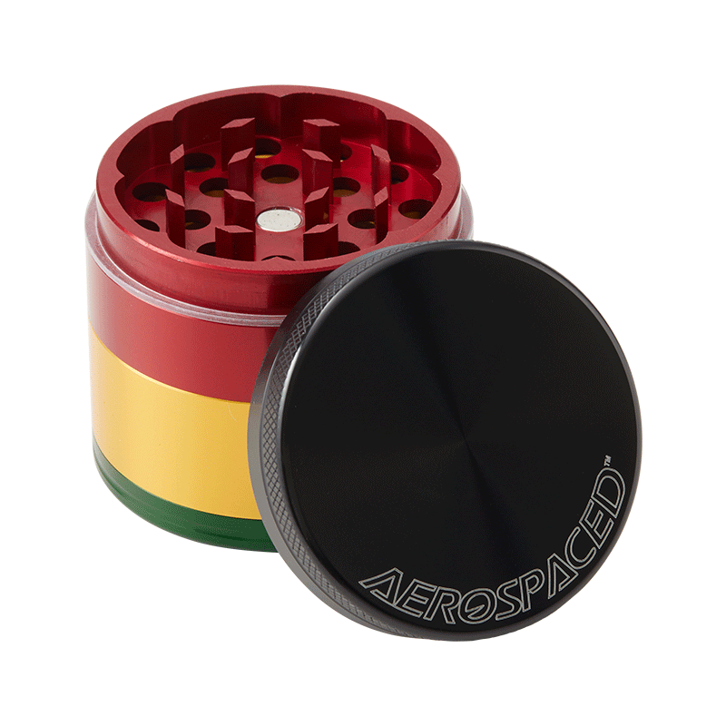 Top view of the aluminum herb grinder showcasing razor-sharp teeth and mesh sifter