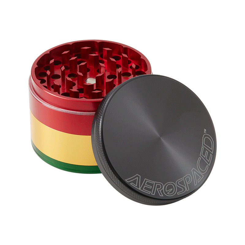 Top view of the aluminum herb grinder showcasing razor-sharp teeth and mesh sifter