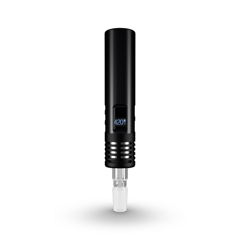 Hand holding the affordable multi-purpose vaporizer in outdoor sunlight for portable use