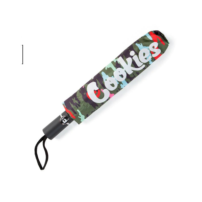 Open compact umbrella with monogram print and water-resistant canopy
