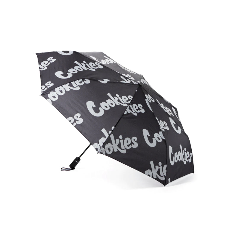 Stylish logo compact umbrella open showing repeated Cookies logo design from above.
