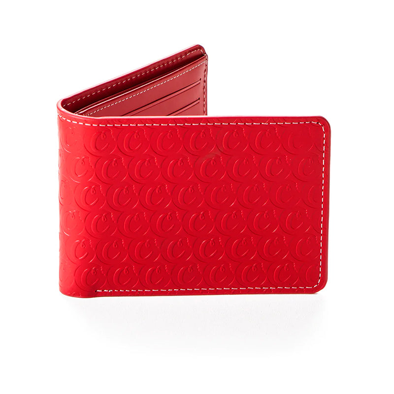 Urban Chic embossed wallet in blue on a wooden table, emphasizing its modern aesthetic.