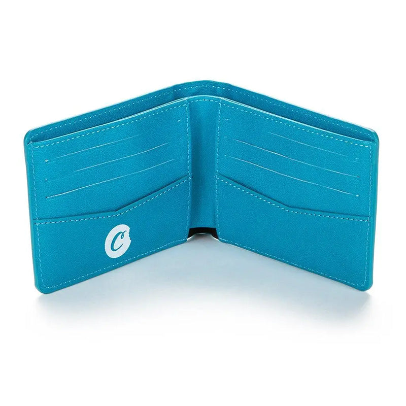 Close-up of the subtle Cookies logo on the textured faux leather wallet, emphasizing its modern streetwear appeal.