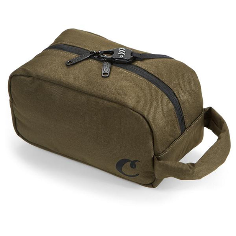 Stylish toiletry bag for men and women resting on a travel suitcase, emphasizing its sleek design.