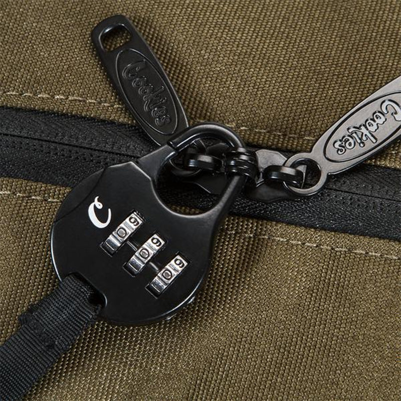 Open view of the compact water-resistant toiletry kit showing interior compartments