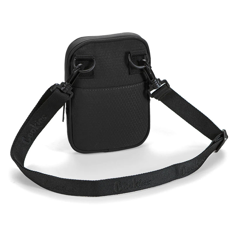 Mint Honeycomb Utility Bag by Cookies, showcasing its sleek design and compartments.