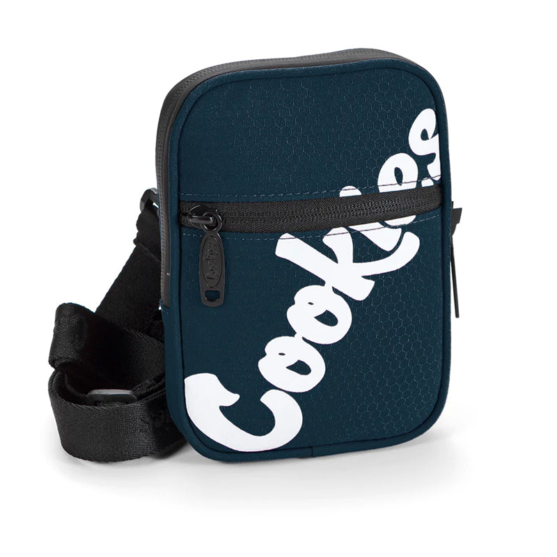 Mint Honeycomb Utility Bag by Cookies, showcasing its sleek design and compartments.