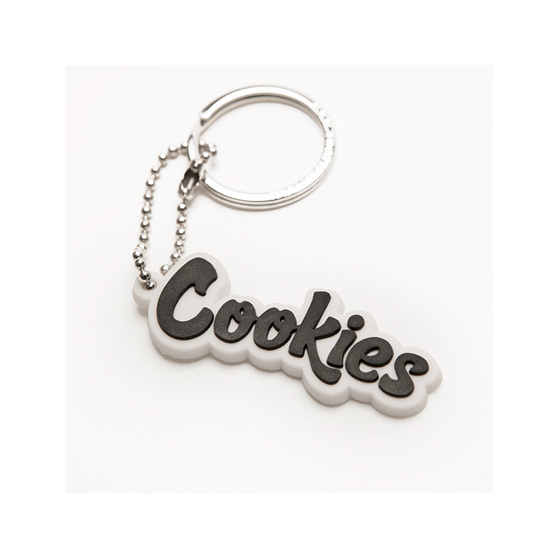 Cookies Mint Keychain attached to a stylish backpack, demonstrating its streetwear-inspired appeal.