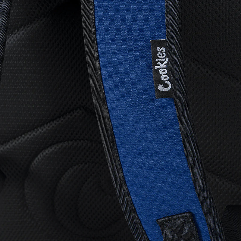 Interior view of the spacious nylon backpack with zip compartments, ideal for school supplies.