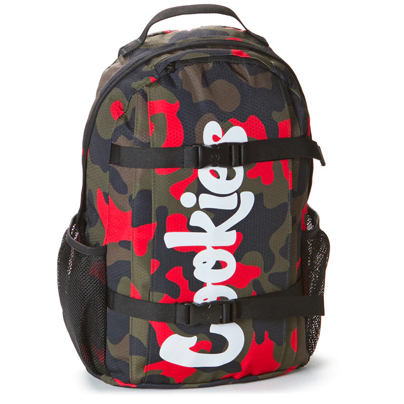 User  carrying the durable camo backpack during an outdoor trip, showcasing its versatility.