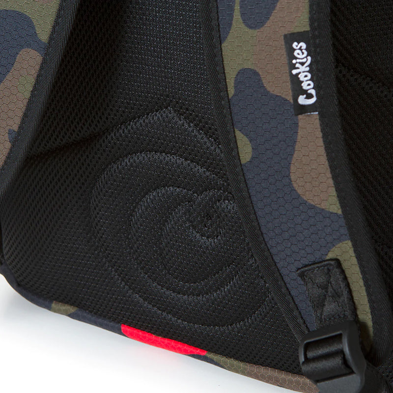 Interior view of the spacious nylon backpack with zip compartments, ideal for school supplies.