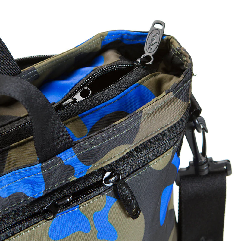 Side view of the Cookies Odor Shield Nylon Backpack highlighting its spacious main compartment.