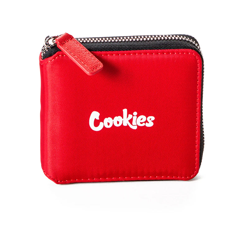 Close-up of the embroidered branding on the chic matte nylon wallet.