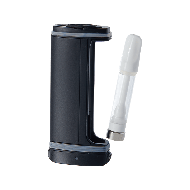 User  holding the DaVinci ARTIQ portable vaporizer in a casual setting, illustrating its on-the-go convenience.