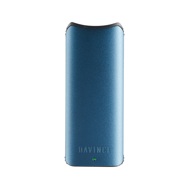 DaVinci ARTIQ vaporizer battery from the side, highlighting its compact design and USB charging port.