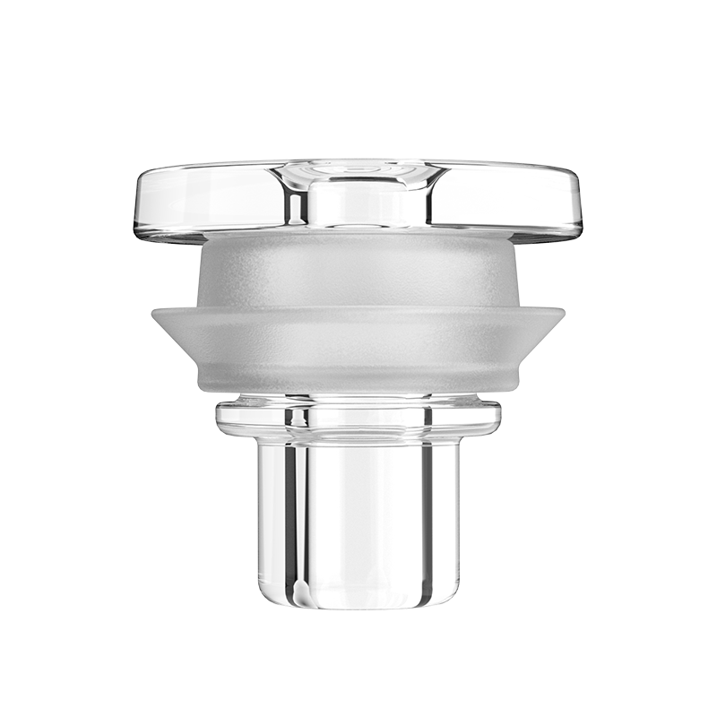 User holding the AUXO Cenote portable dab rig showing its compact size and app control interface
