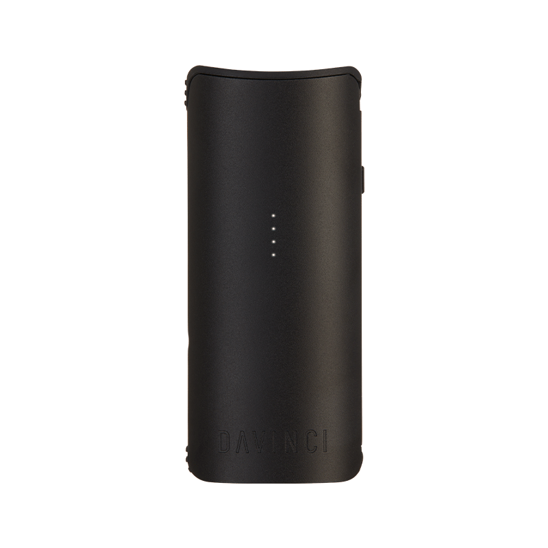 DaVinci MIQRO-C vaporizer displayed next to a dry herb setup, perfect for beginners.