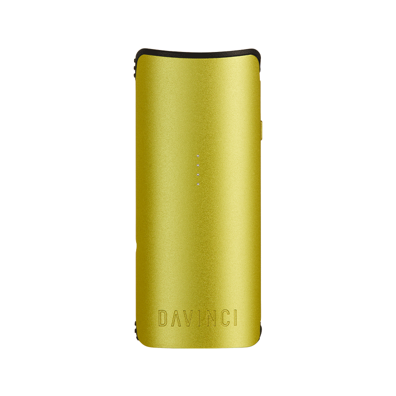 DaVinci MIQRO-C vaporizer displayed next to a dry herb setup, perfect for beginners.