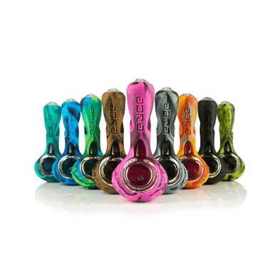 Galactic Alien Silicone Smoking Pipe in a natural outdoor setting, highlighting its travel-friendly design.