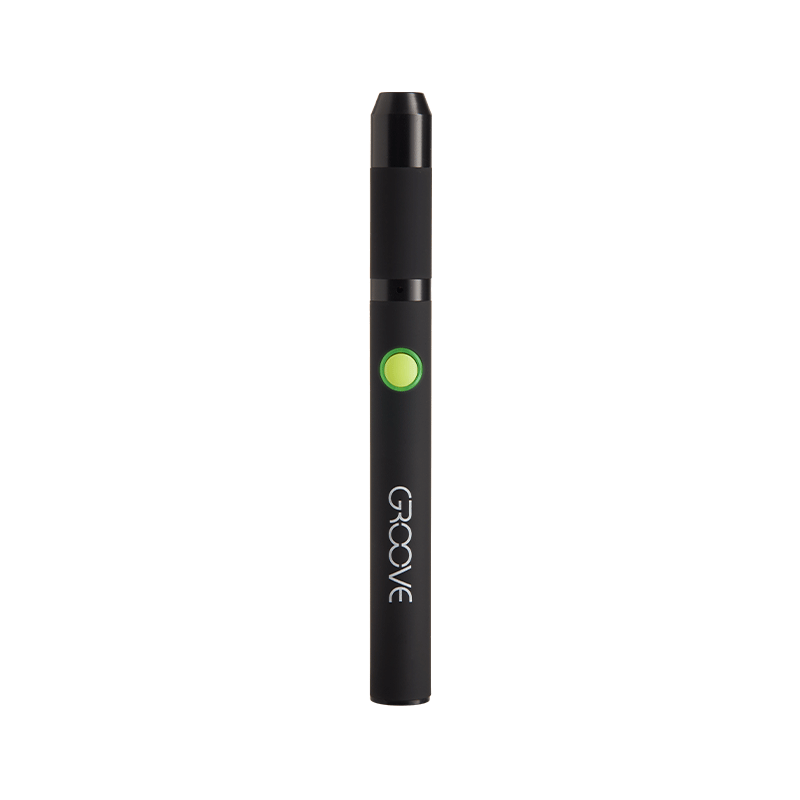 User  enjoying the Groove Cara dab pen in a discreet setting.