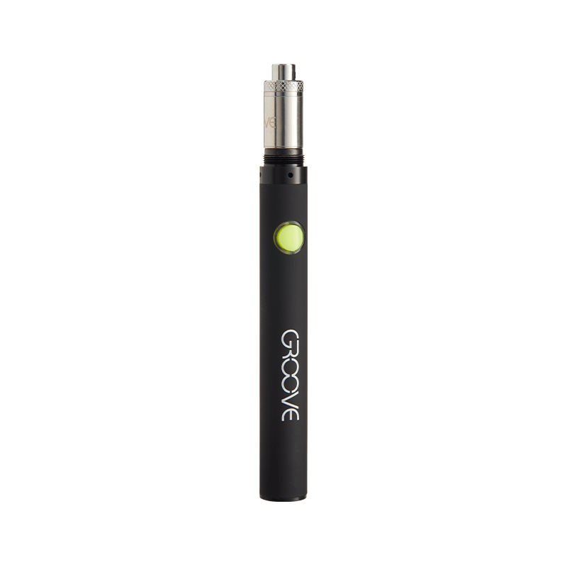 User  enjoying the Groove Cara dab pen in a discreet setting.