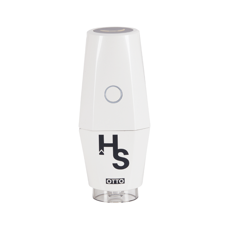 Banana Bros OTTO grinder showcasing its sleek design and functionality while grinding herbs.
