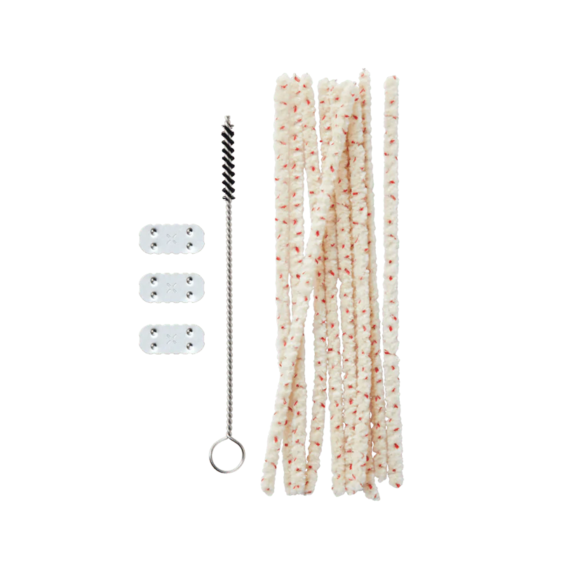 Close-up of PAX maintenance tools including brushes and wipes.