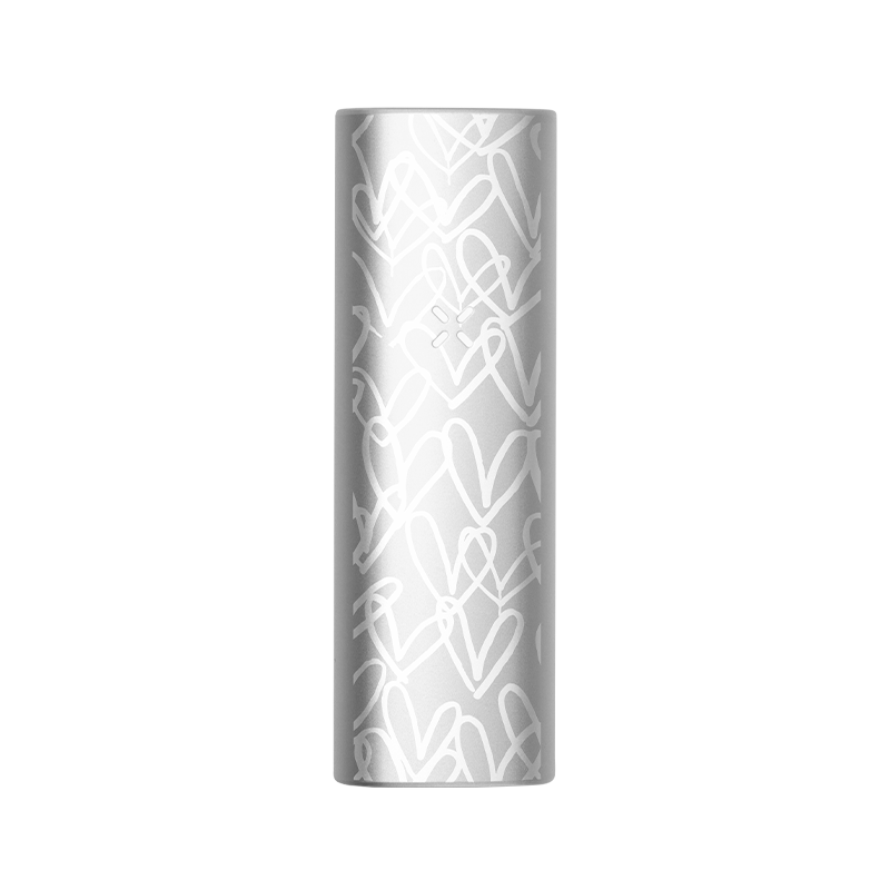 Front view of the PAX Mini Goldcrown dry herb vaporizer showing sleek design and compact size