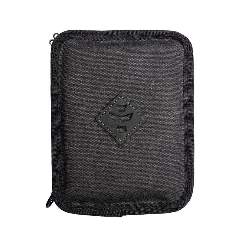 Close-up of the 4-inch glass smoking pipe nestled in the odor-proof case