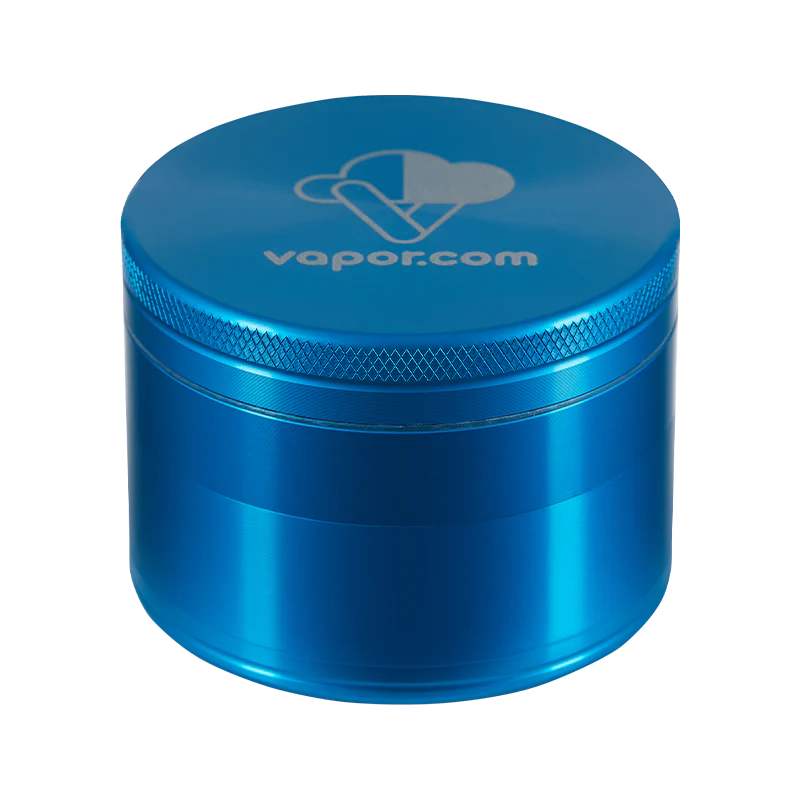 VaporMate 4-Piece Aluminum Grinder held in hand to demonstrate its lightweight, portable design.
