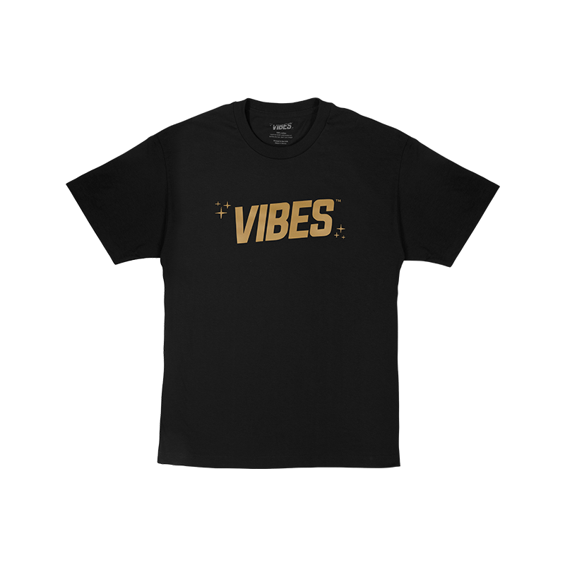 Close-up of blue t-shirt with gold logo on chest for casual style