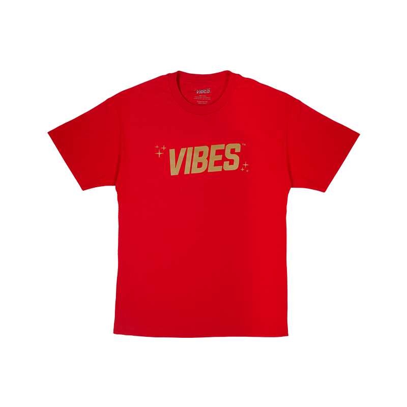 Close-up of blue t-shirt with gold logo on chest for casual style