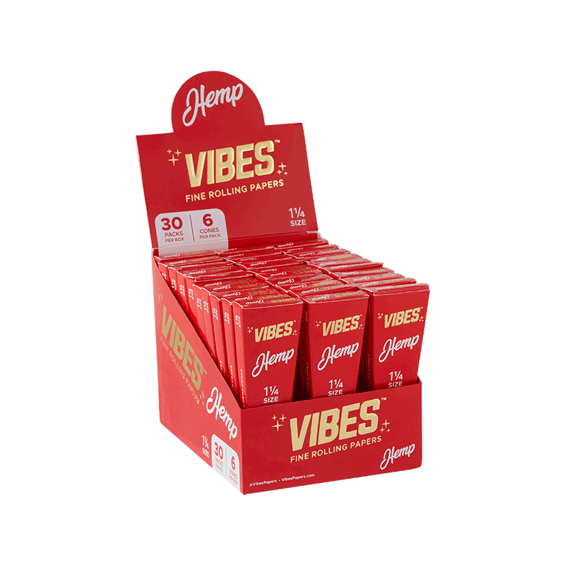 Close-up of Vibes cones being filled with herbs, highlighting their ultra-thin paper.