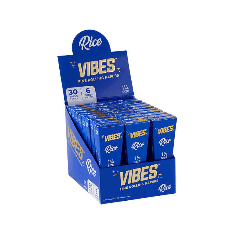 Group of friends enjoying a smoke session using Vibes pre-rolled cones outdoors.
