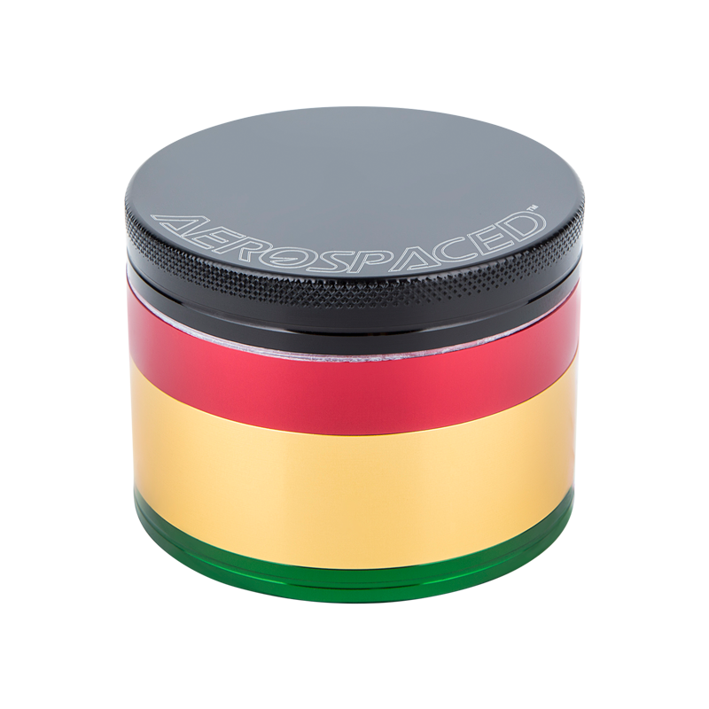 Aerospaced 4-piece aluminum herb grinder with magnetic lid and kief catcher in use
