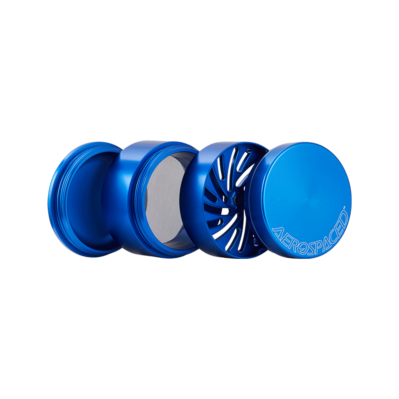 Top view of the 4-piece toothless herb grinder showcasing its sleek design and grooves for easy material placement.
