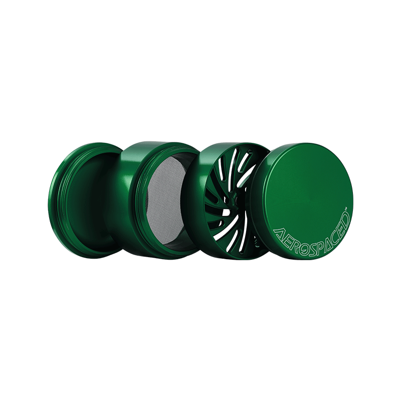 Top view of the 4-piece toothless herb grinder showcasing its sleek design and grooves for easy material placement.